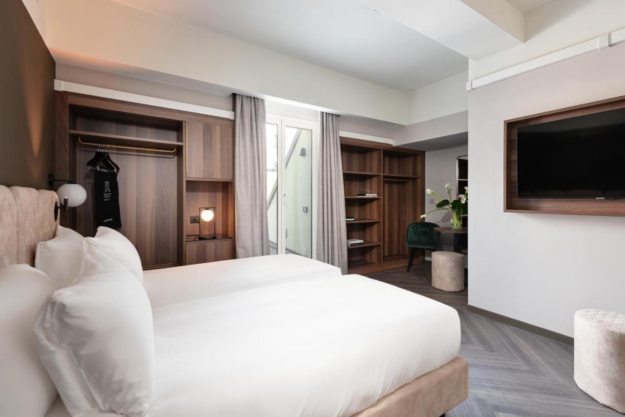 Hotel Tocq Milan Bagian luar foto